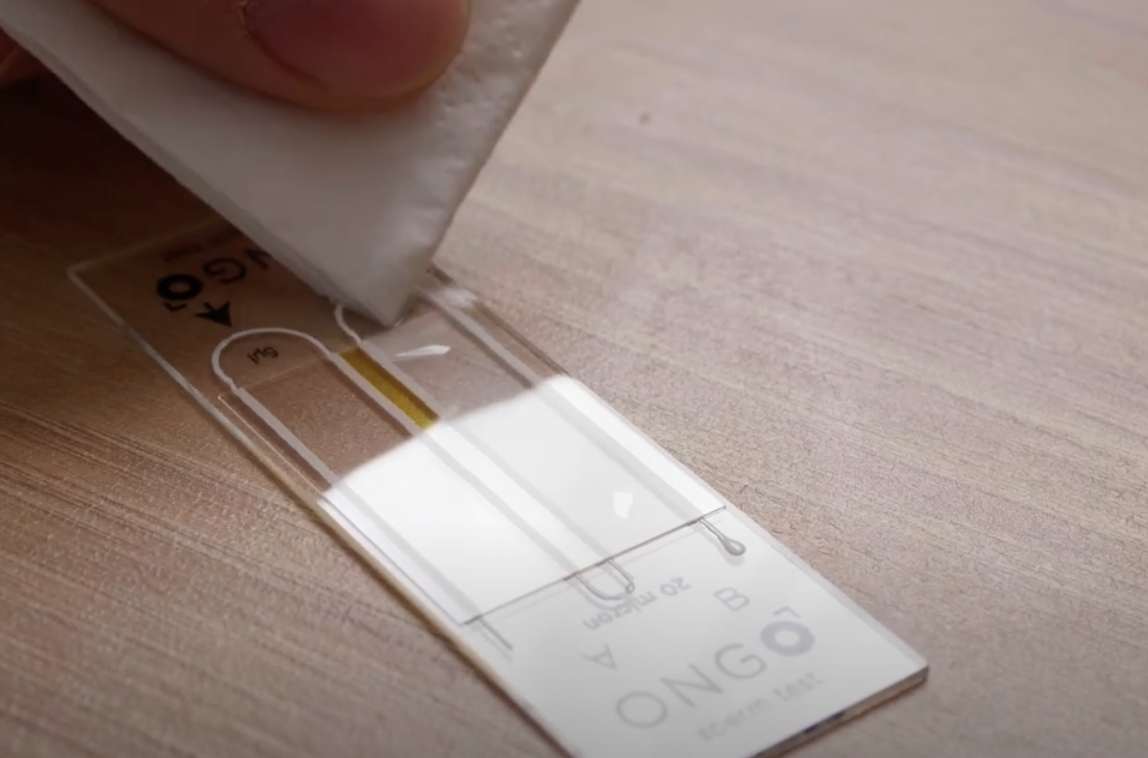 Ongo Slide drift prevention by removing excess sample